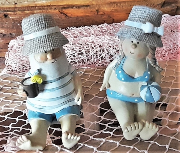 Urlauber-Pärchen sitzend