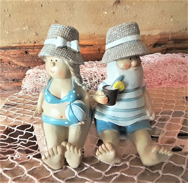 Urlauber-Pärchen sitzend